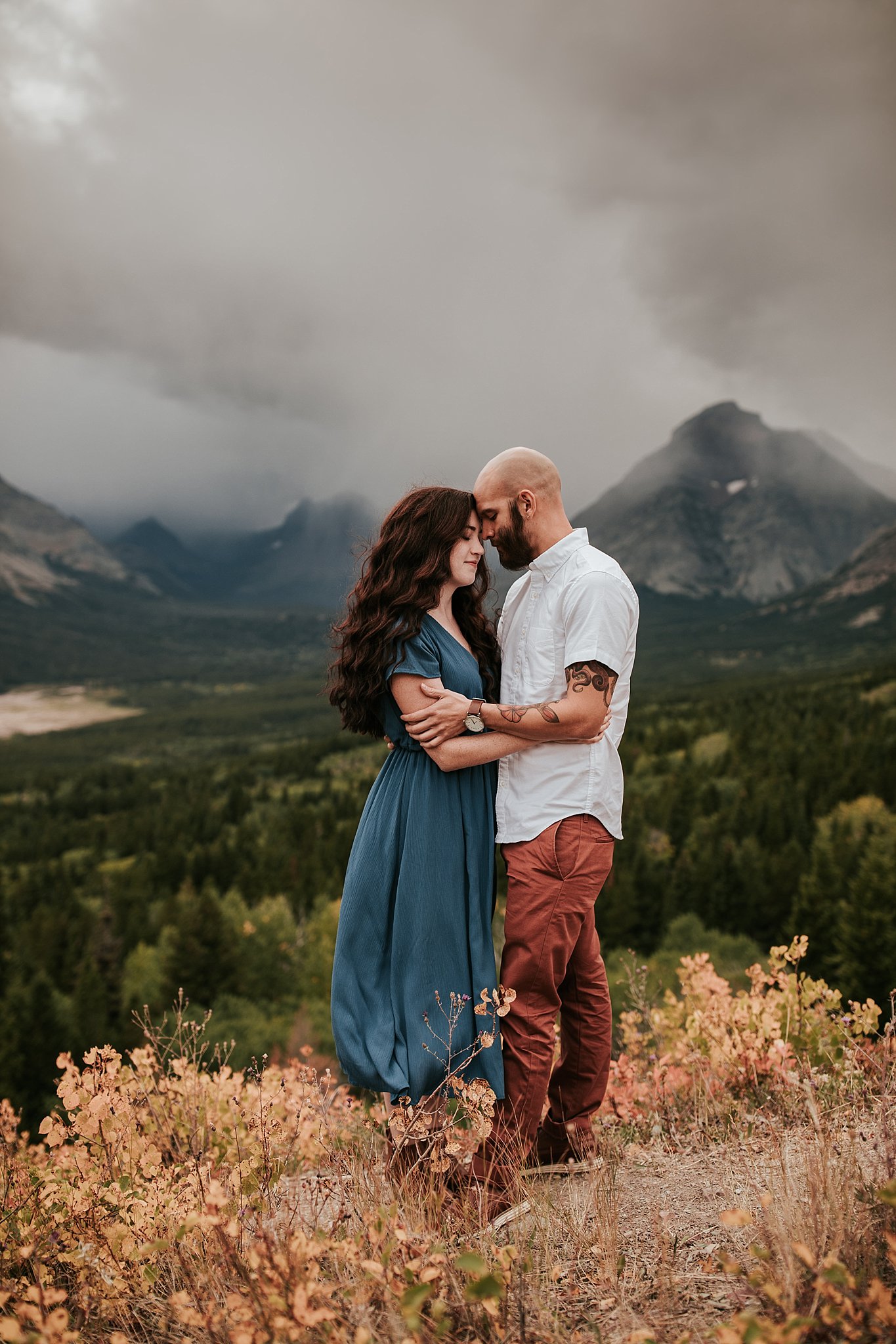couple in the mountains engagement photos