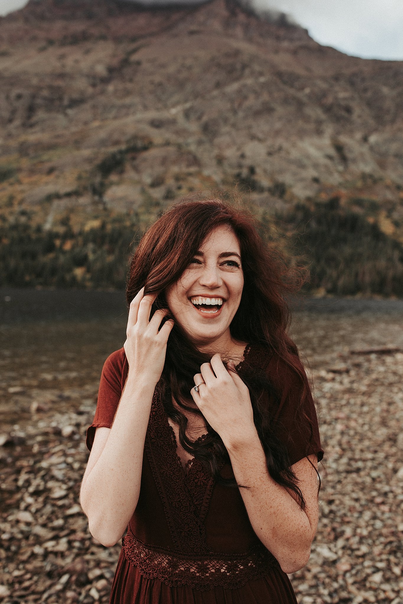 Woman Laughing by a Lake