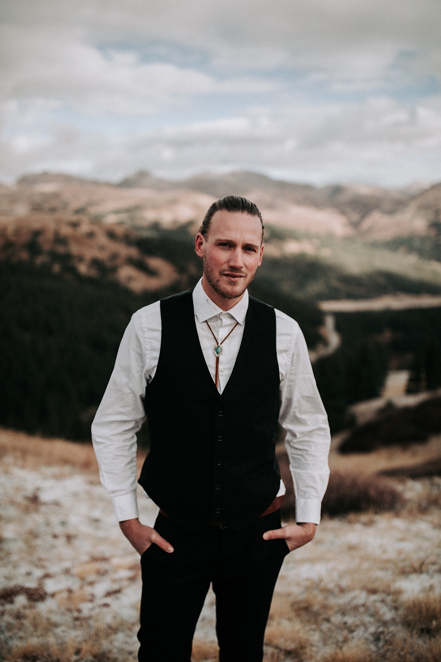 Boho groom style for mountain elopement