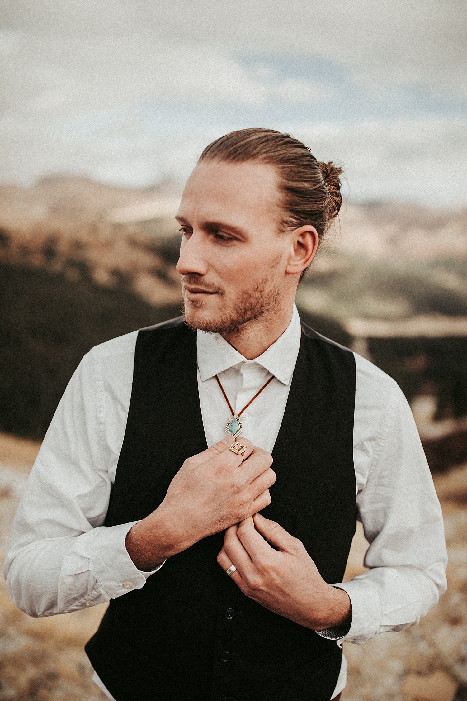 mountain top boho elopement with groom